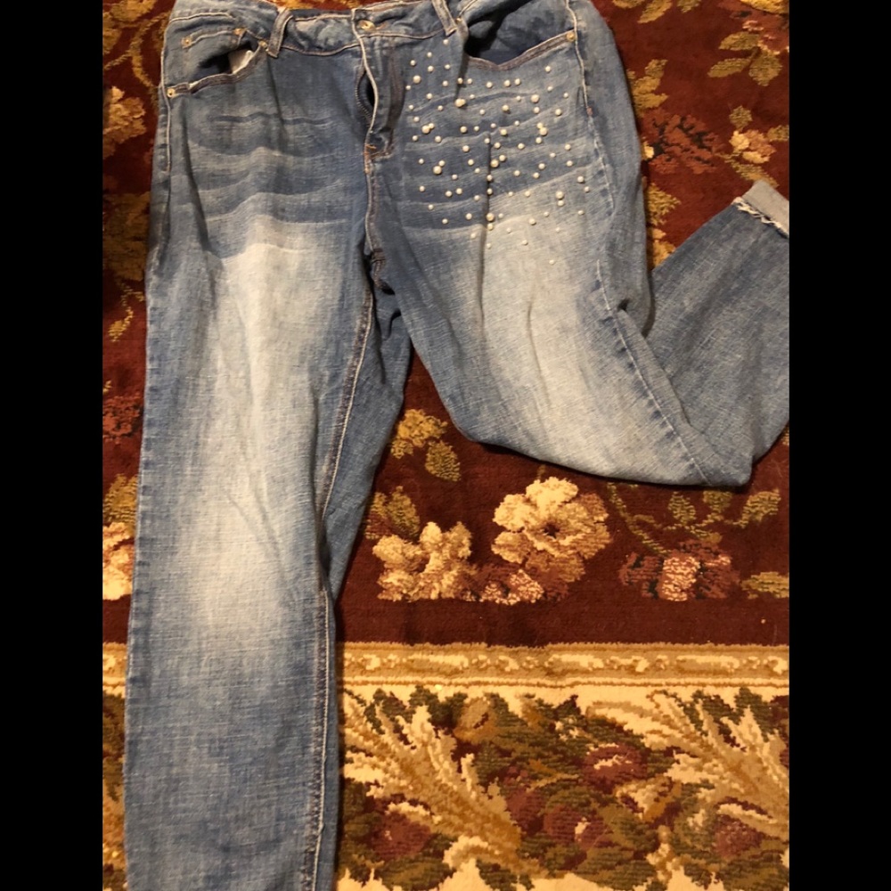 Faded jeans w/ pearl embellishments